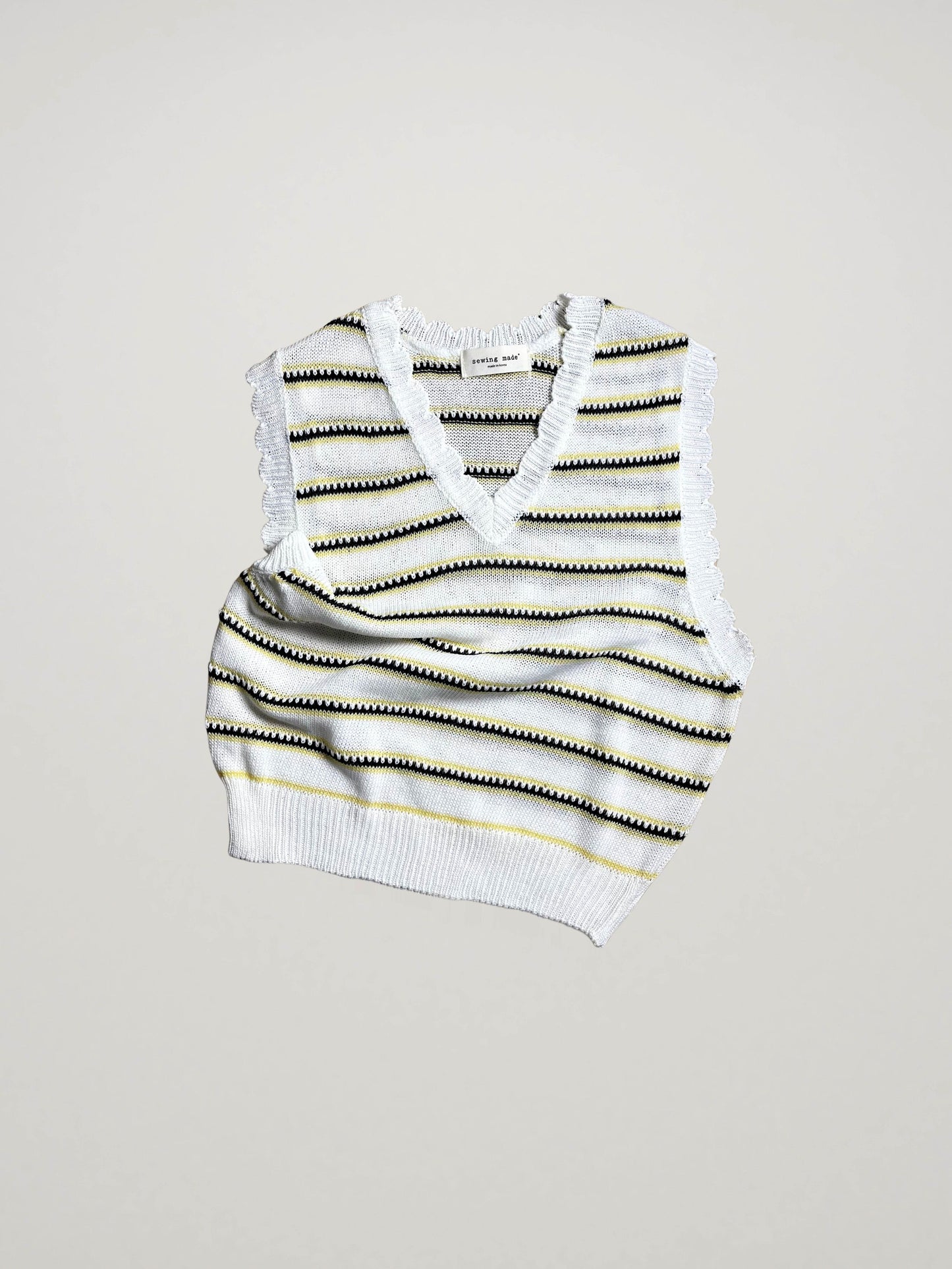 KNITTED VEST IN STRIPES