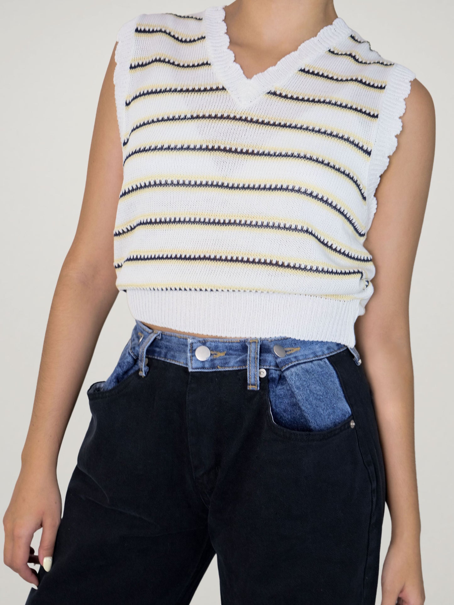 KNITTED VEST IN STRIPES